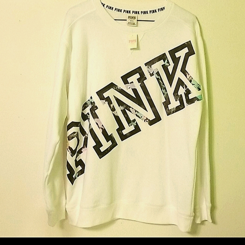 Victoria Secret sweater with water colors inside the pink logo size medium